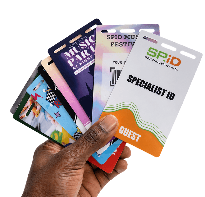 Hand holding professionally printed event badges